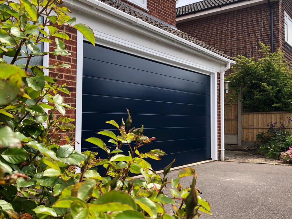 Sectional garage door in blue.