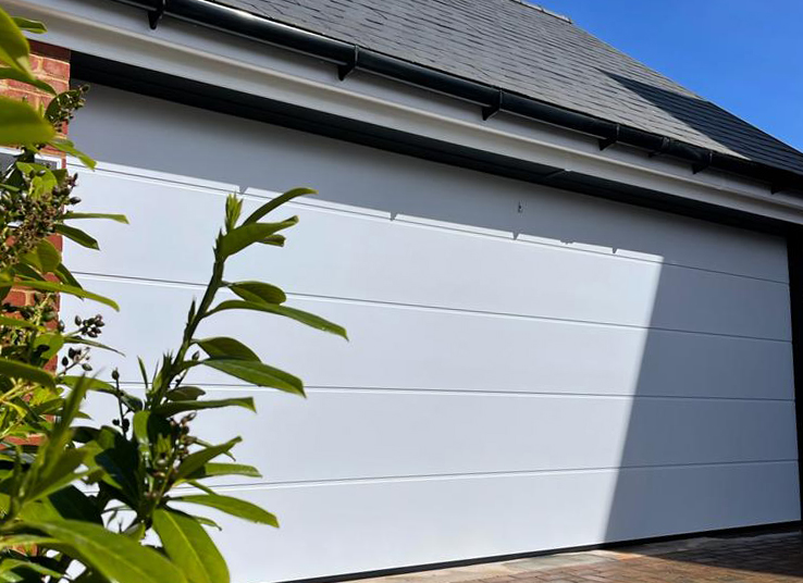 2in1 sectional garage door in white.