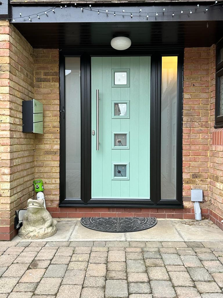 Composite front door in Chartwell Green fitted by Skandoor.