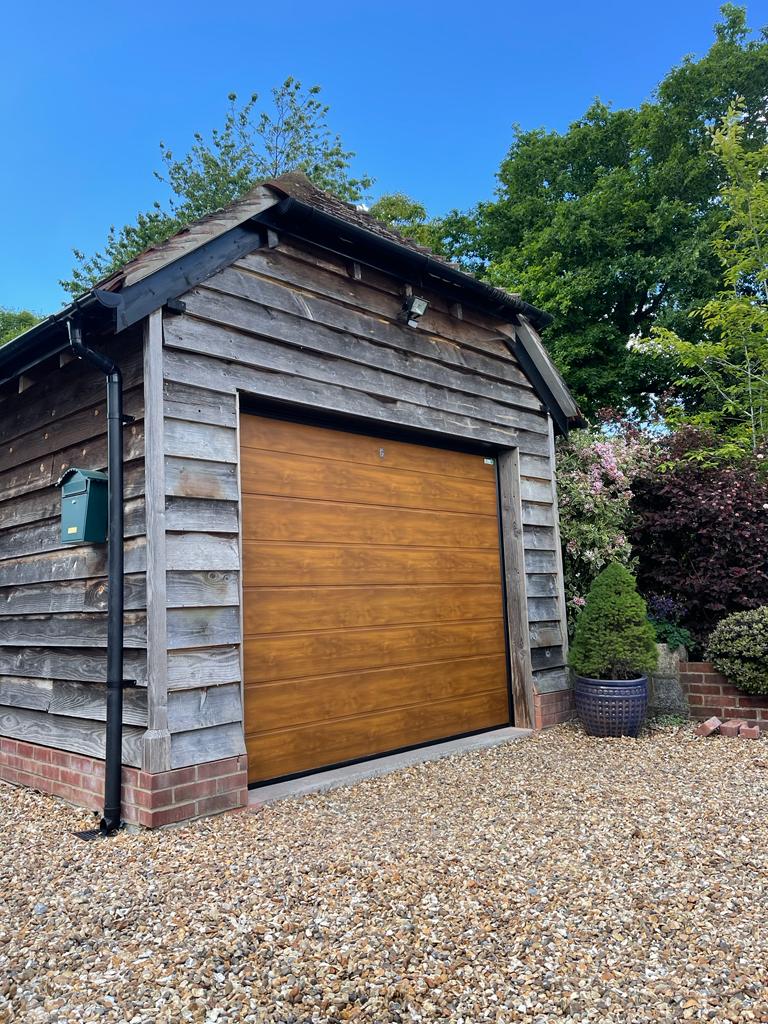 installing a garage door into oak building